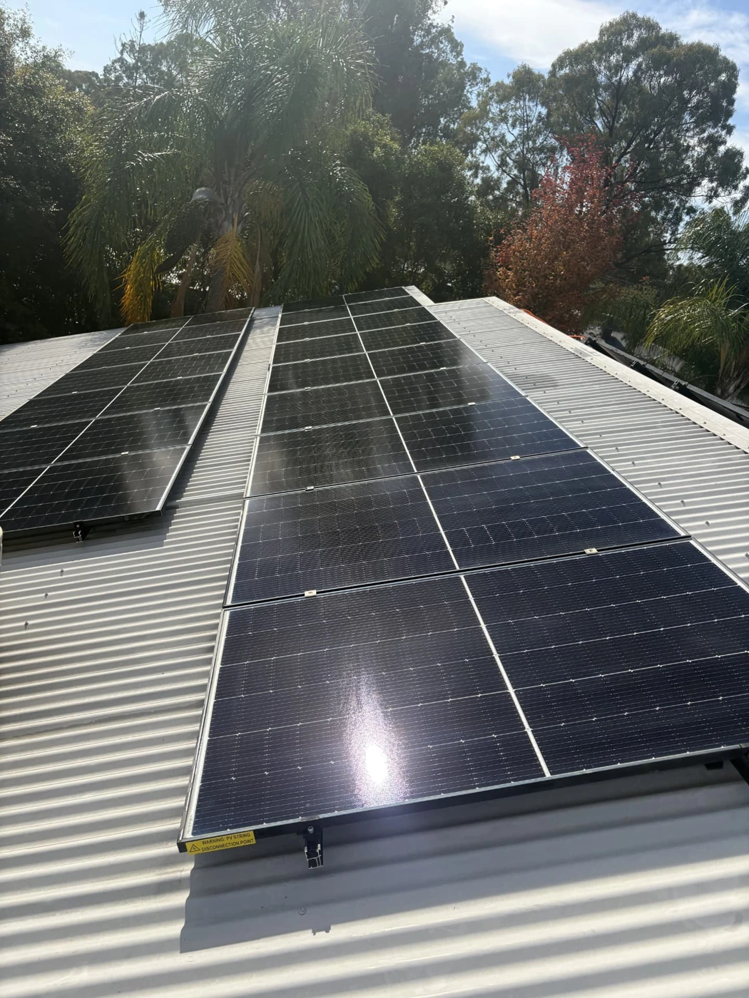Freshly cleaned solar panels on a colorbond roof in Shepparton