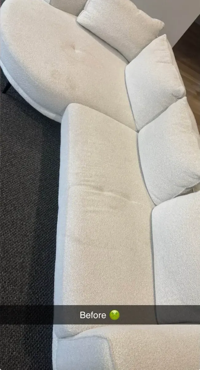White boucle sofa after upholstery cleaning by Shepp City Carpet Cleaning