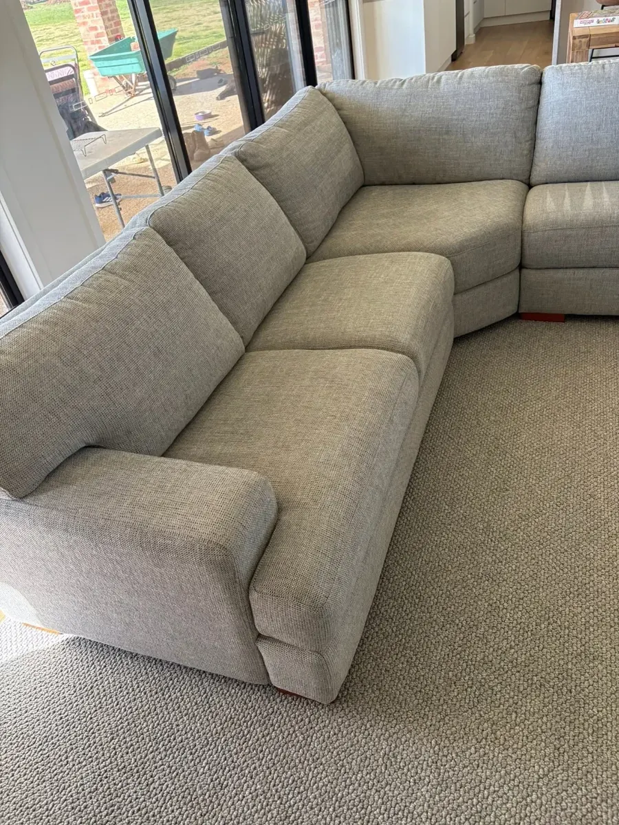 Grey L-shaped sectional sofa in Shepparton living room, freshly cleaned by Shepp City Carpet Cleaning